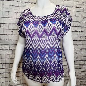 Torrid purple geo print bow back sheer blouse.